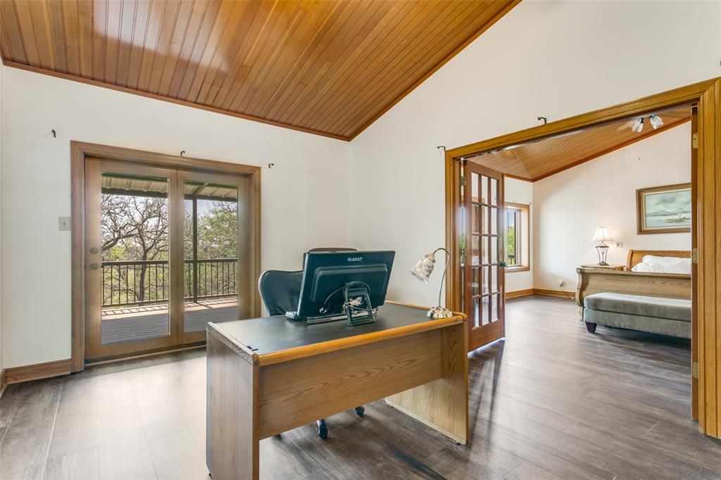 1557 Latigo Hills Road Bartonville, TX 75022 - Photo 13 of 40 Office with french doors, a vaulted wood ceiling, and wood finished floors