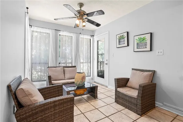 a living room with furniture and a couch