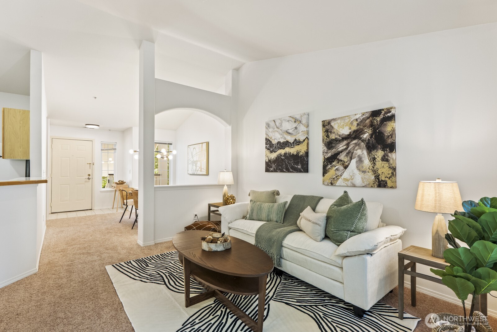 17204 123rd Place Northeast, Unit N304 Bothell, WA 98011 - Photo 15 of 40 a living room with furniture and wooden floor