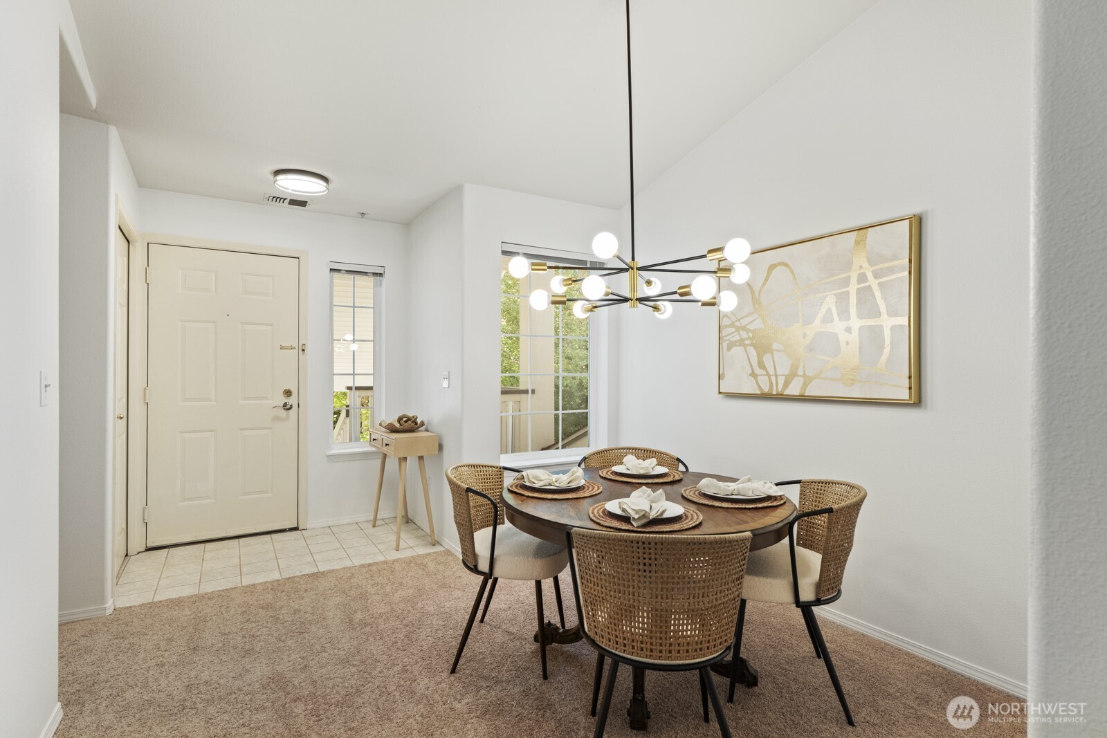 17204 123rd Place Northeast, Unit N304 Bothell, WA 98011 - Photo 19 of 40 a view of a dining room with furniture window and wooden floor