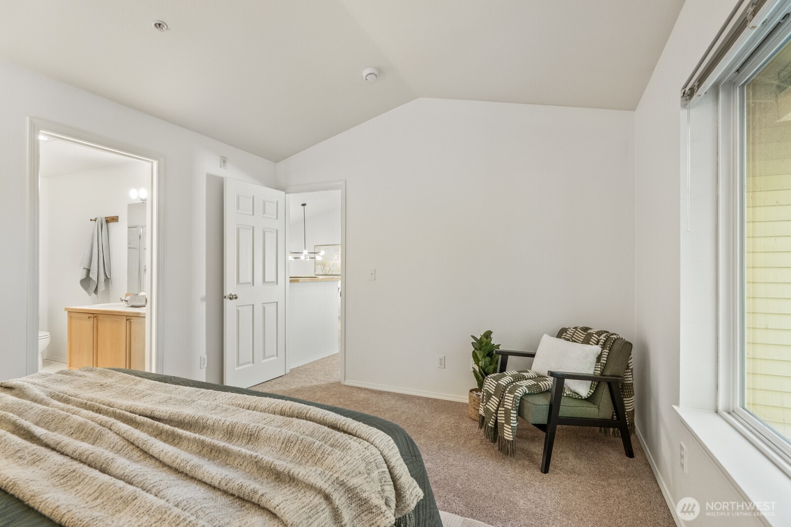 17204 123rd Place Northeast, Unit N304 Bothell, WA 98011 - Photo 22 of 40 a bedroom with a bed and a window