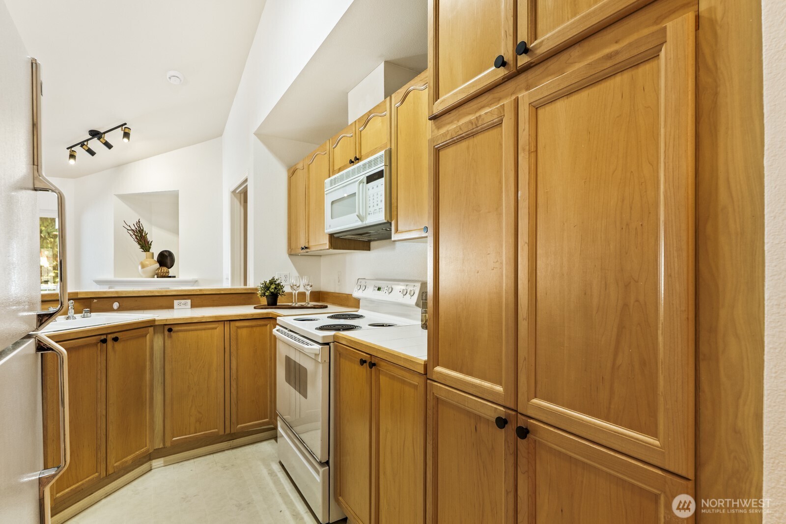 17204 123rd Place Northeast, Unit N304 Bothell, WA 98011 - Photo 29 of 40 a view of a kitchen with a sink
