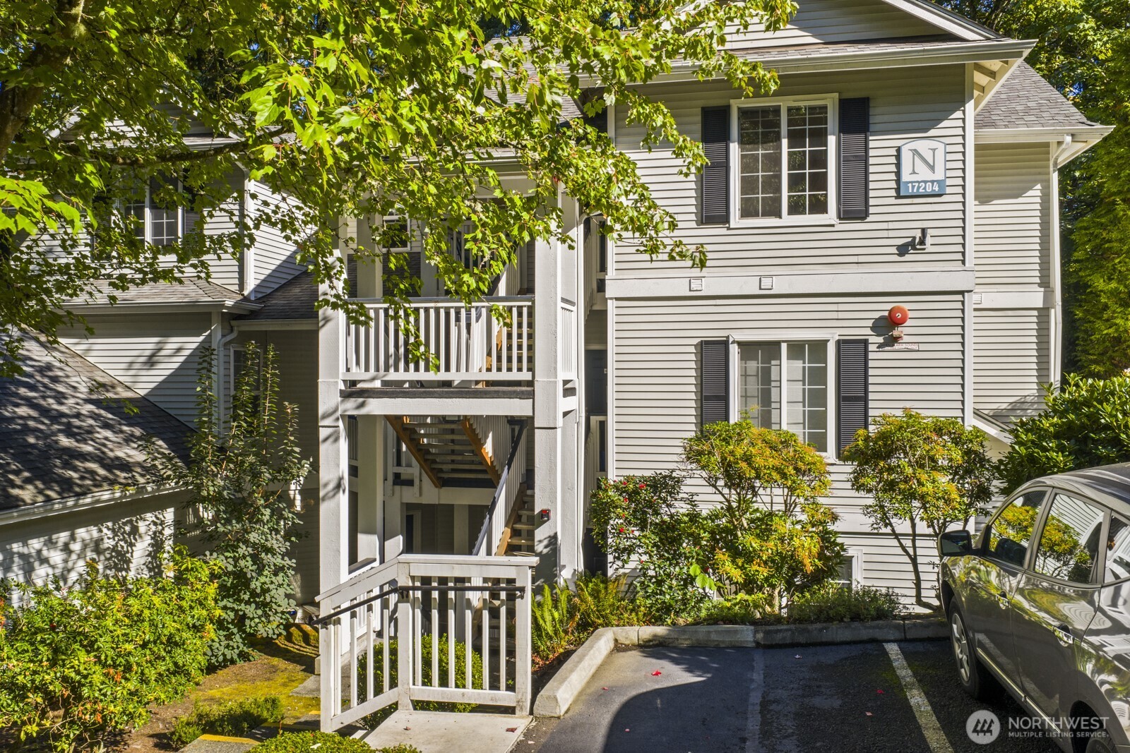 17204 123rd Place Northeast, Unit N304 Bothell, WA 98011 - Photo 5 of 40 front view of a house with a yard