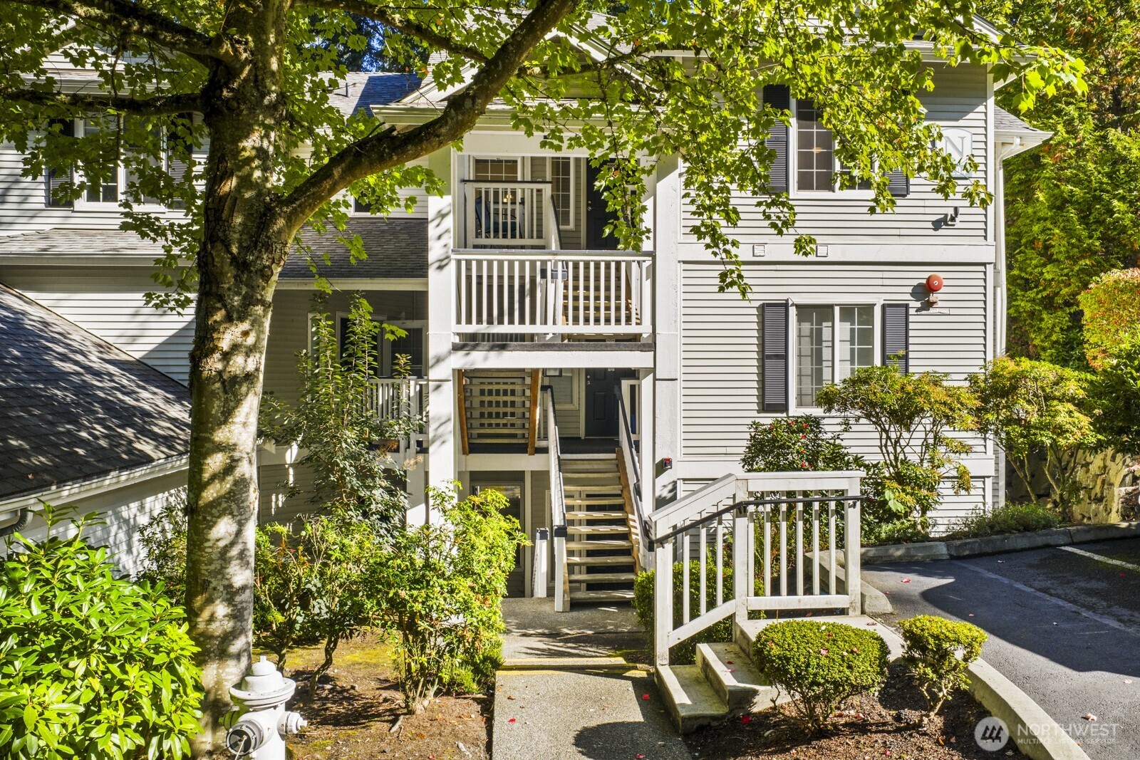 17204 123rd Place Northeast, Unit N304 Bothell, WA 98011 - Photo 6 of 40 a view of a house with a patio