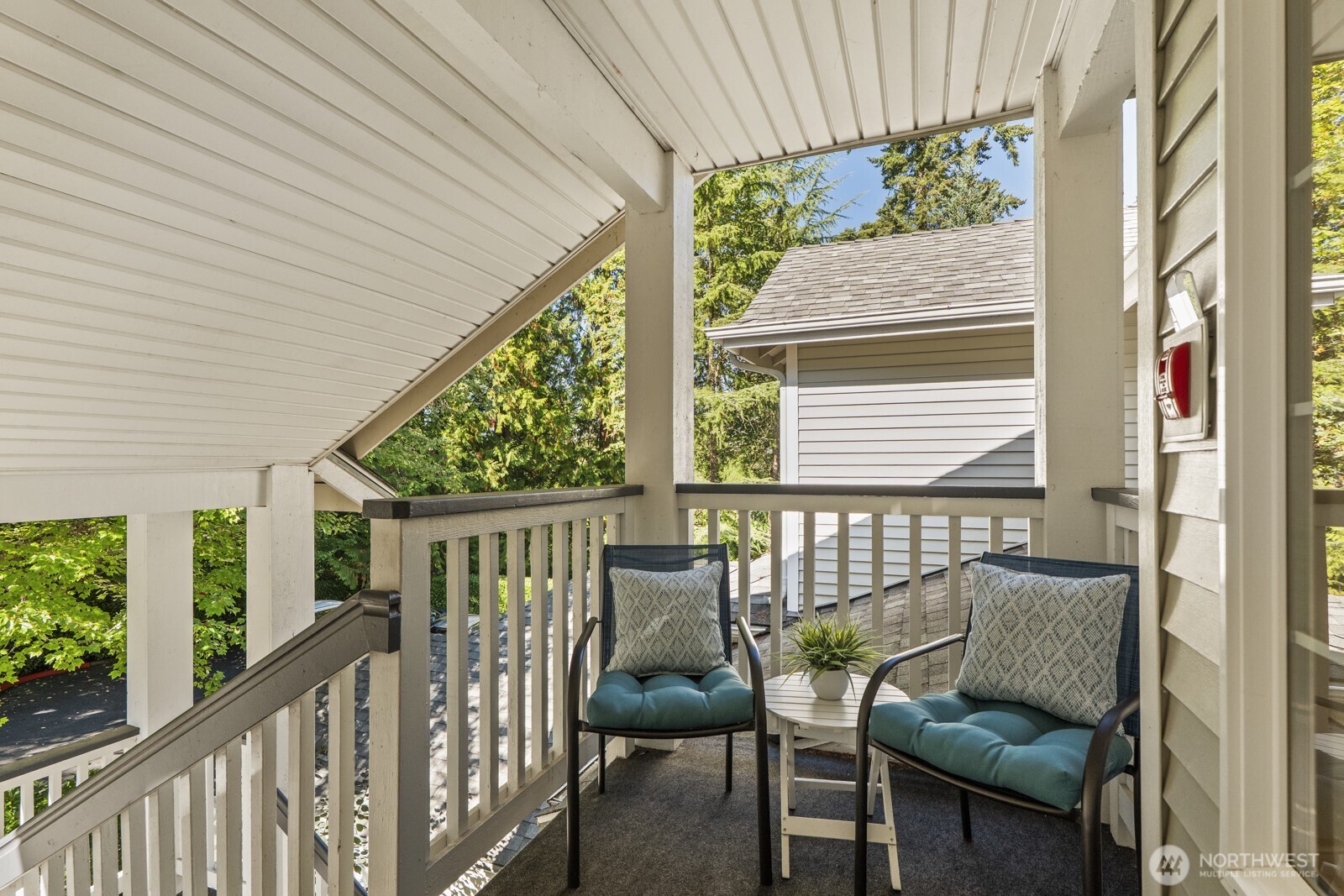 17204 123rd Place Northeast, Unit N304 Bothell, WA 98011 - Photo 8 of 40 a view of a two chairs in the balcony