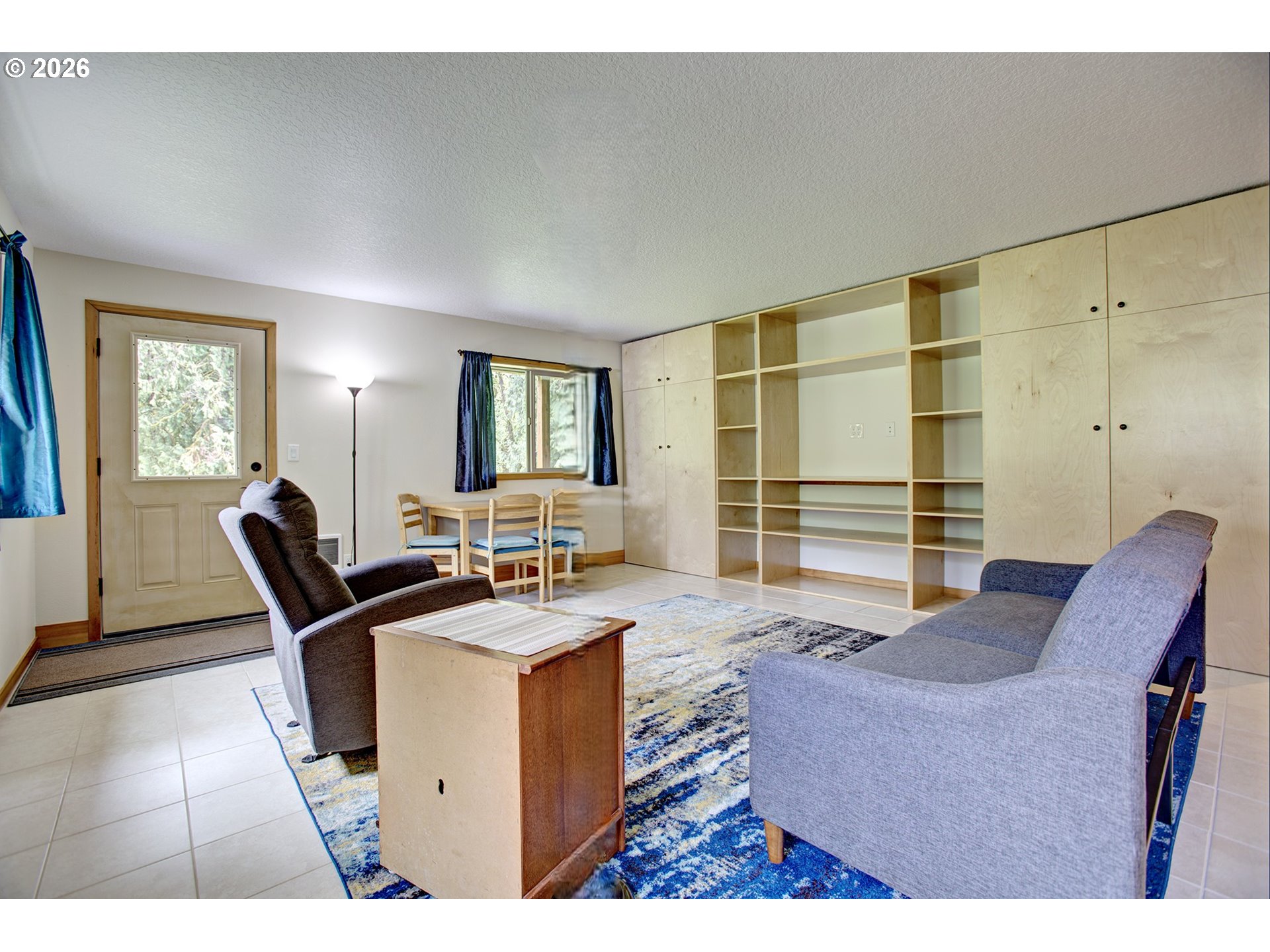 60300 Rays Way St. Helens, OR 97051 - Photo 27 of 41 a living room with furniture a large window and wooden floor