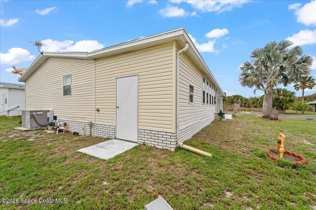 7628 Boxelder Road Micco, FL 32976 - Photo 26 of 30 Back Entry to Storage Area