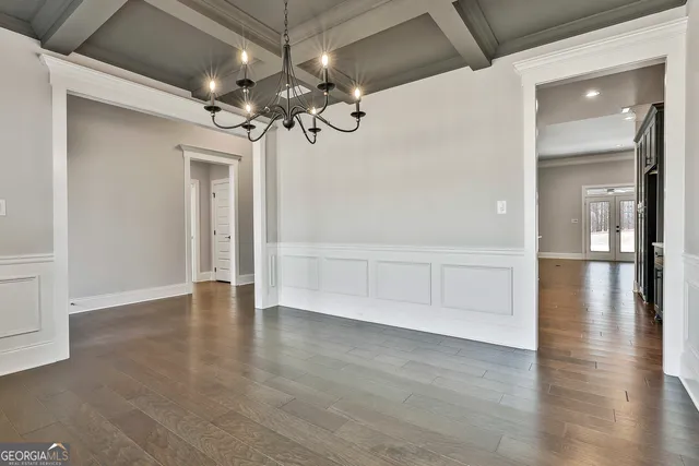 a view of a livingroom with wooden floor