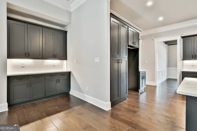 a spacious bathroom with a shower and a sink