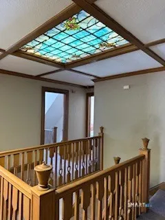 a view of balcony with small garden