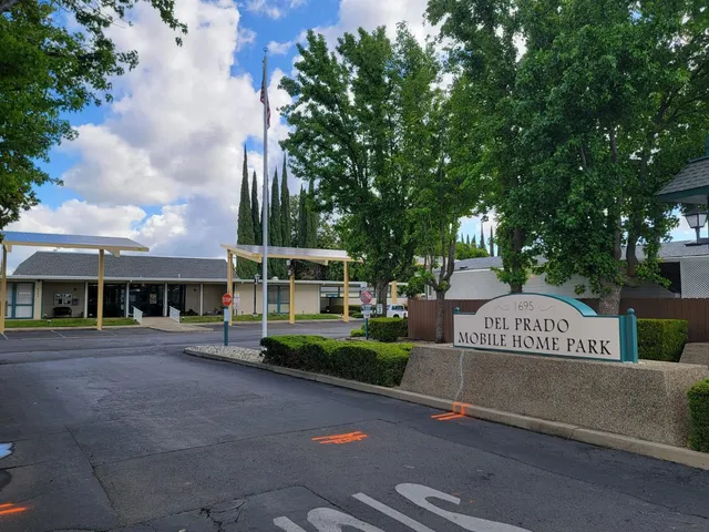 a front view of a building with garden