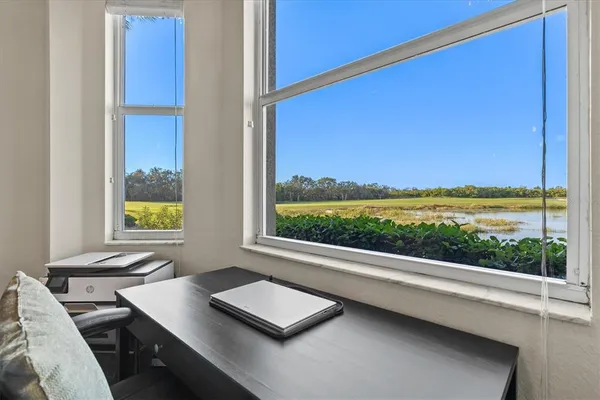 a bedroom with a bed and a shower