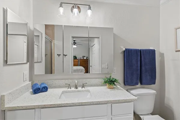 a view of a building with large tree