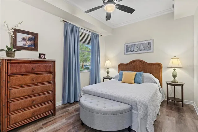 a view of a swimming pool with outdoor seating and a lots of buildings