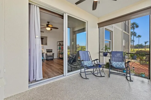 a view of a balcony with lake view and a ocean view