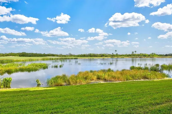 a view of a dining table and chairs
