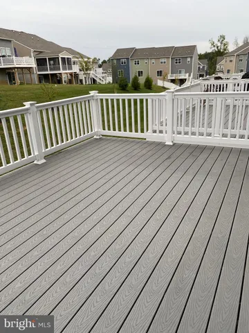 a balcony with wooden floor
