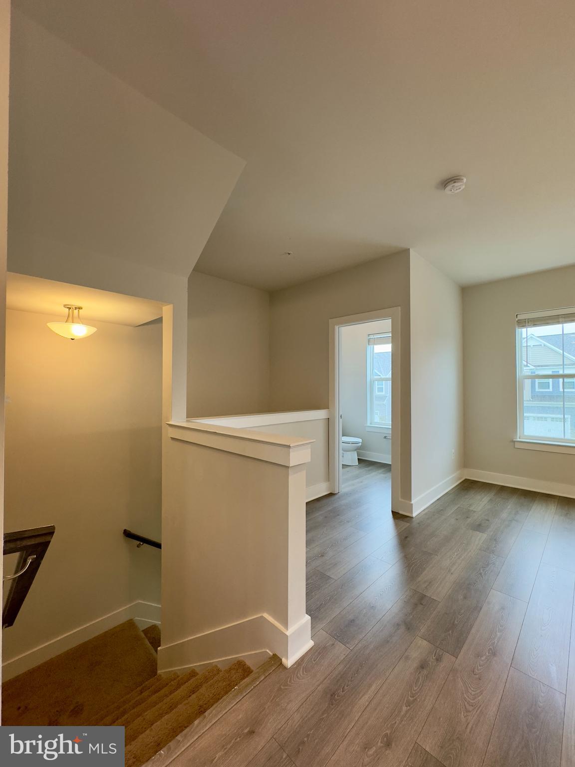 2775 Town View Circle New Windsor, MD 21776 - Photo 14 of 29 a view of empty room with wooden floor