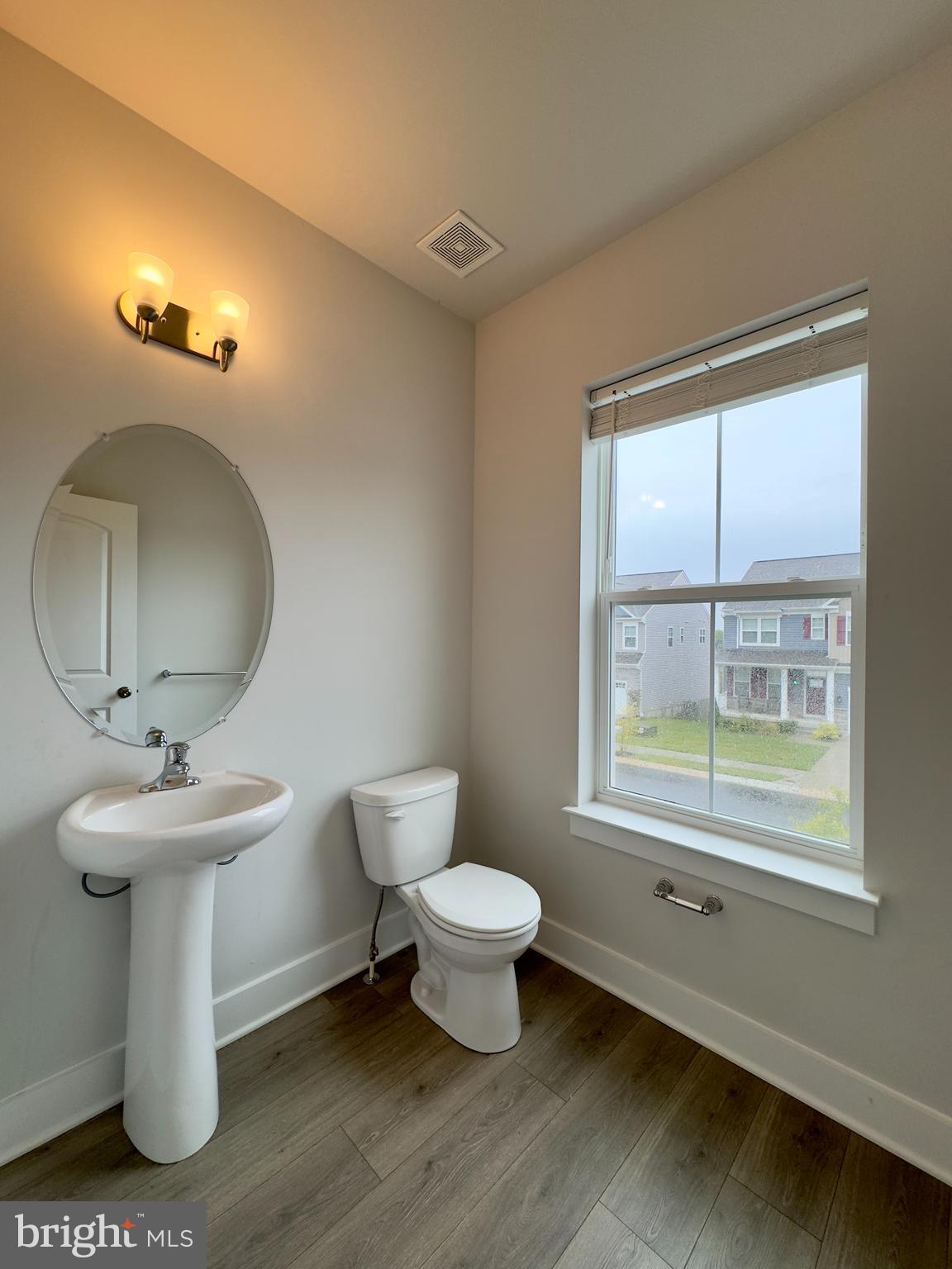 2775 Town View Circle New Windsor, MD 21776 - Photo 16 of 29 a bathroom with a toilet sink and mirror
