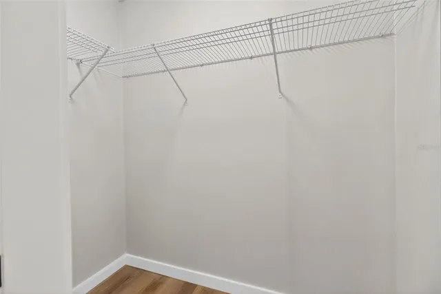 a view of a room with racks on the wall