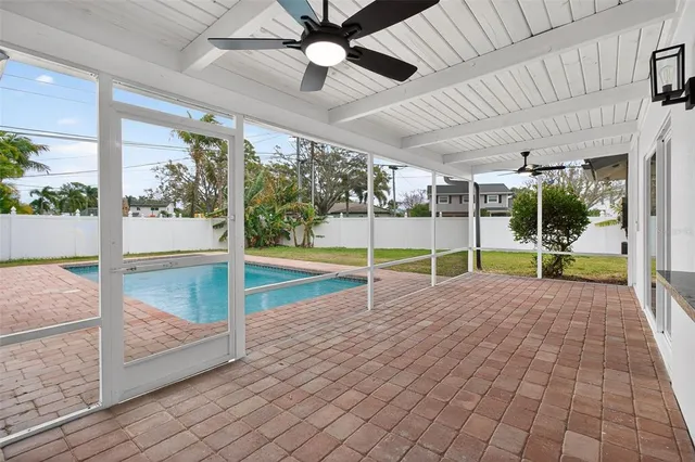 a view of a swimming pool with an outdoor space