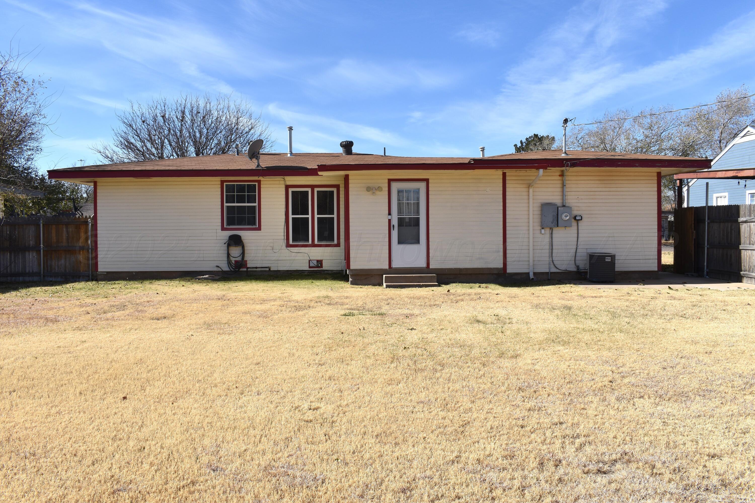 1919 Cherry Street Amarillo, TX 79106 - Photo 17 of 19 a view of a house with wooden fence