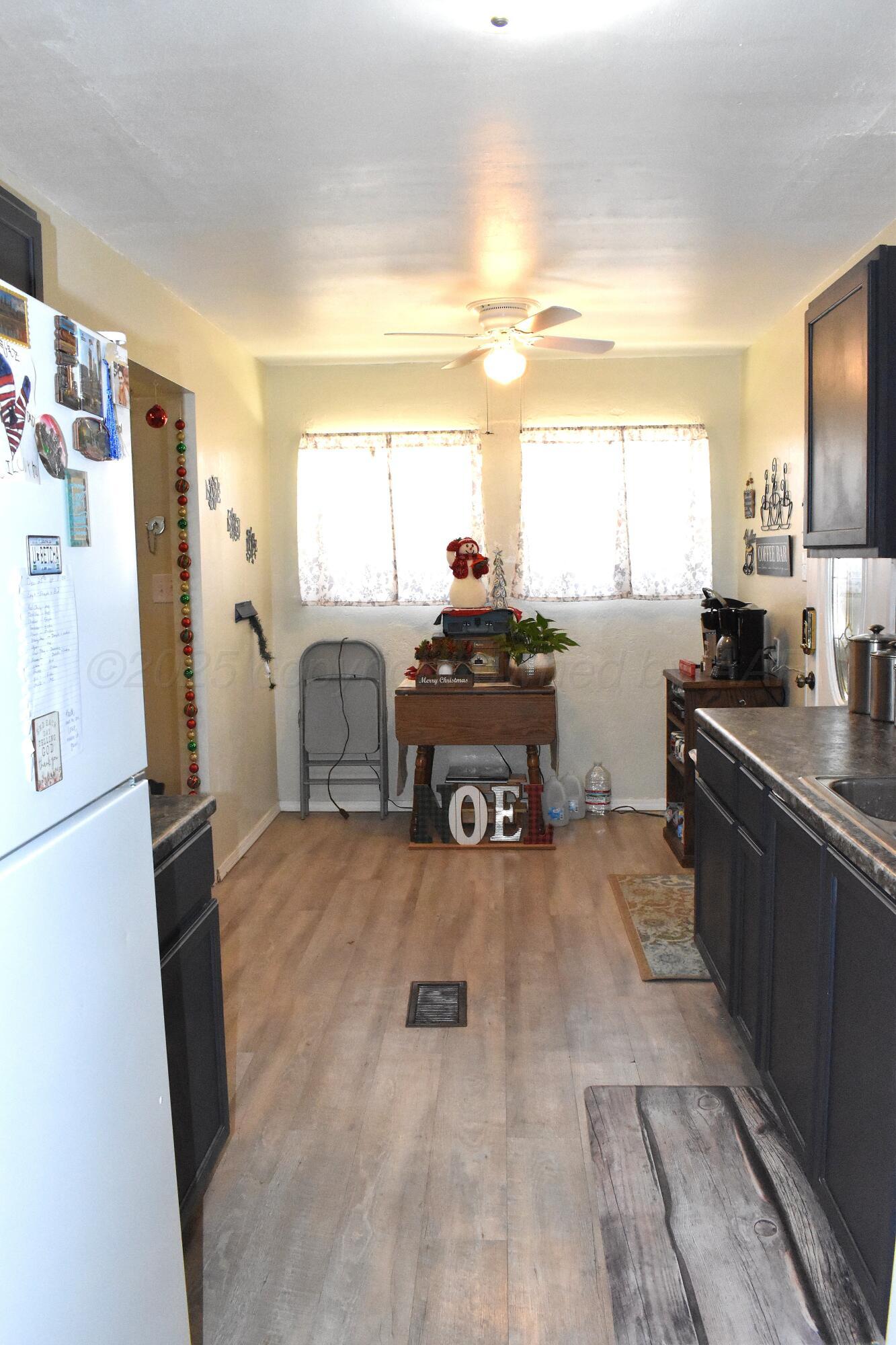 1919 Cherry Street Amarillo, TX 79106 - Photo 8 of 19 a living room with furniture and a large window