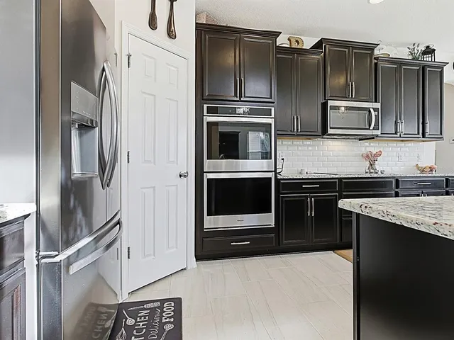 a view of a dining room with furniture and window