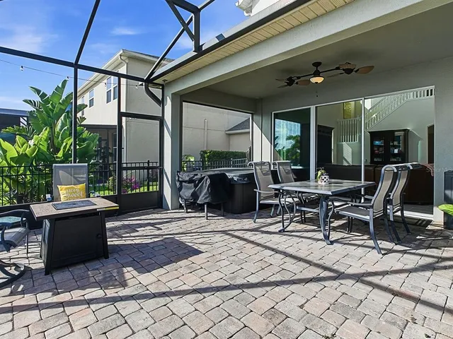 a view of a house with backyard porch and garden