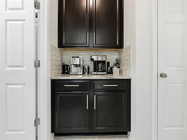 a bedroom with a bed closet and a window