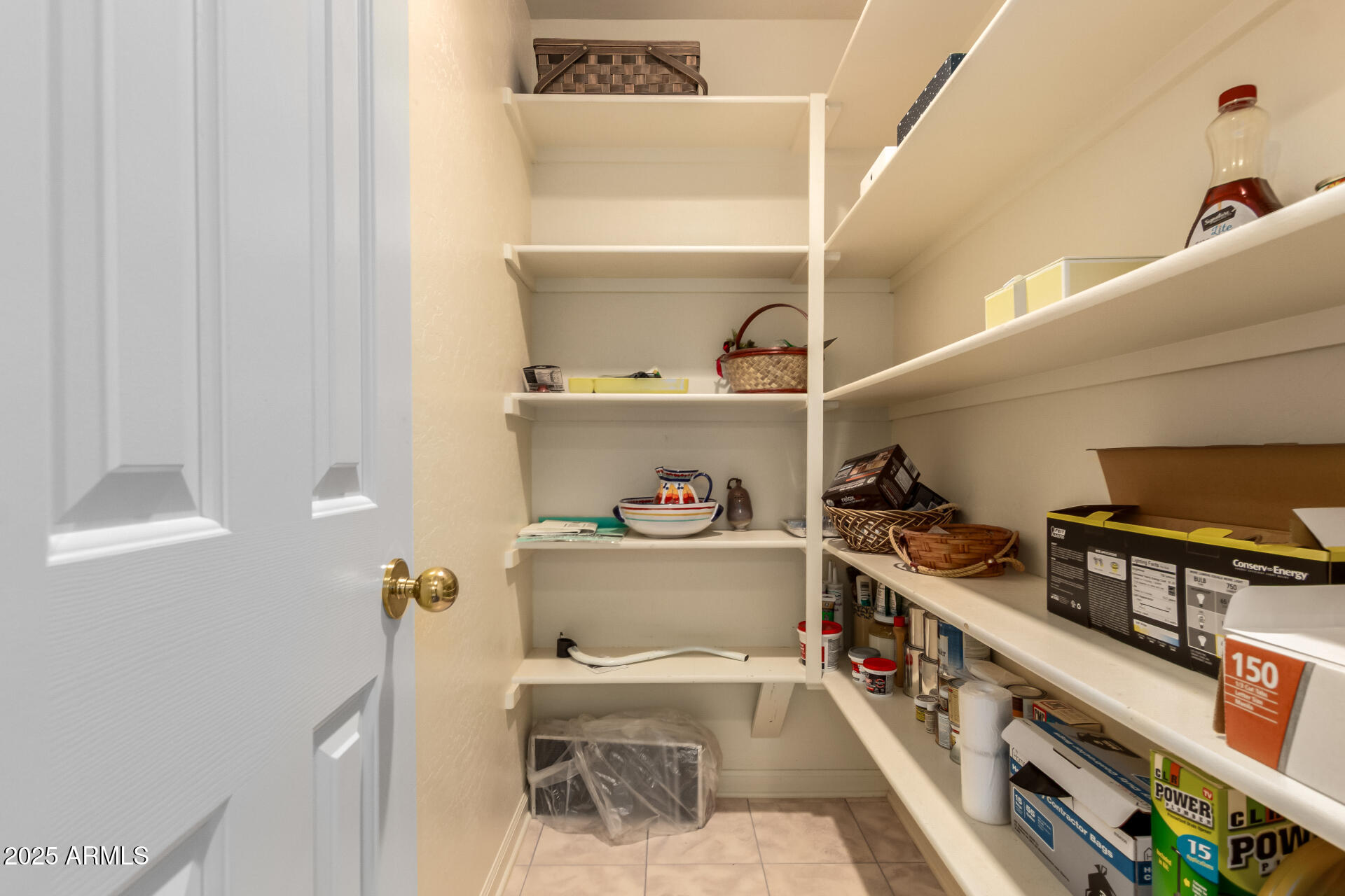 25628 Cordova Lane Rio Verde, AZ 85263 - Photo 14 of 35 a view of walk in closet with clothes and shoes