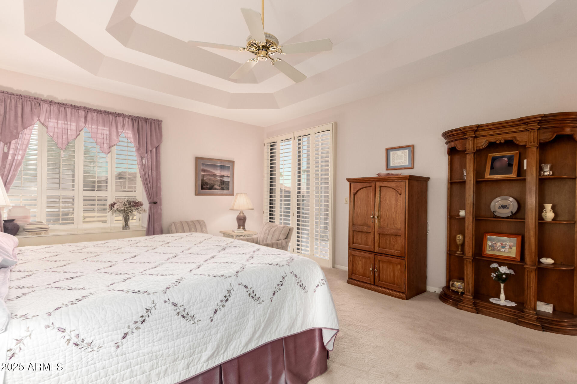 25628 Cordova Lane Rio Verde, AZ 85263 - Photo 21 of 35 a spacious bedroom with a bed and a closet