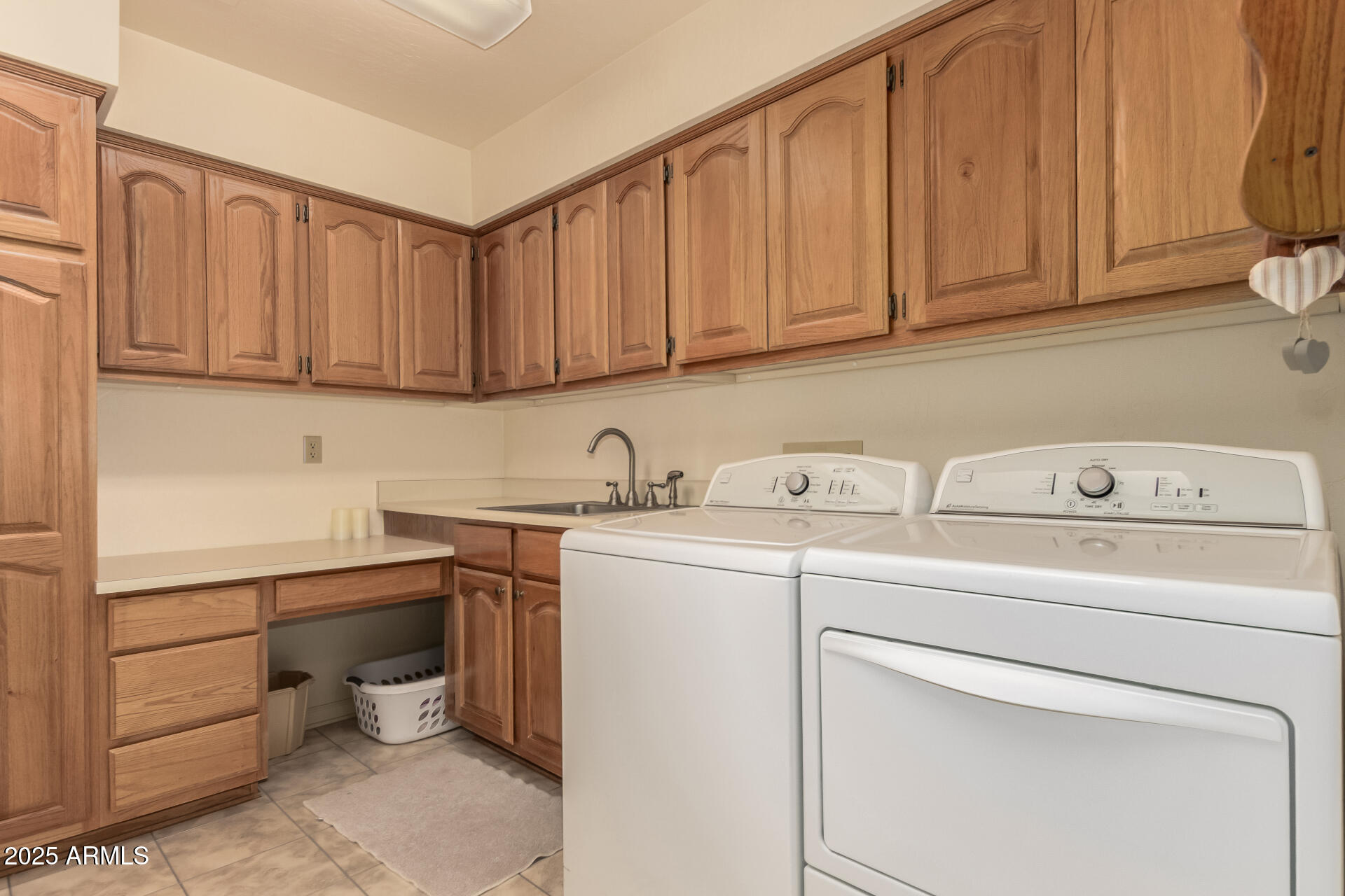 25628 Cordova Lane Rio Verde, AZ 85263 - Photo 28 of 35 a utility room with dryer and washer