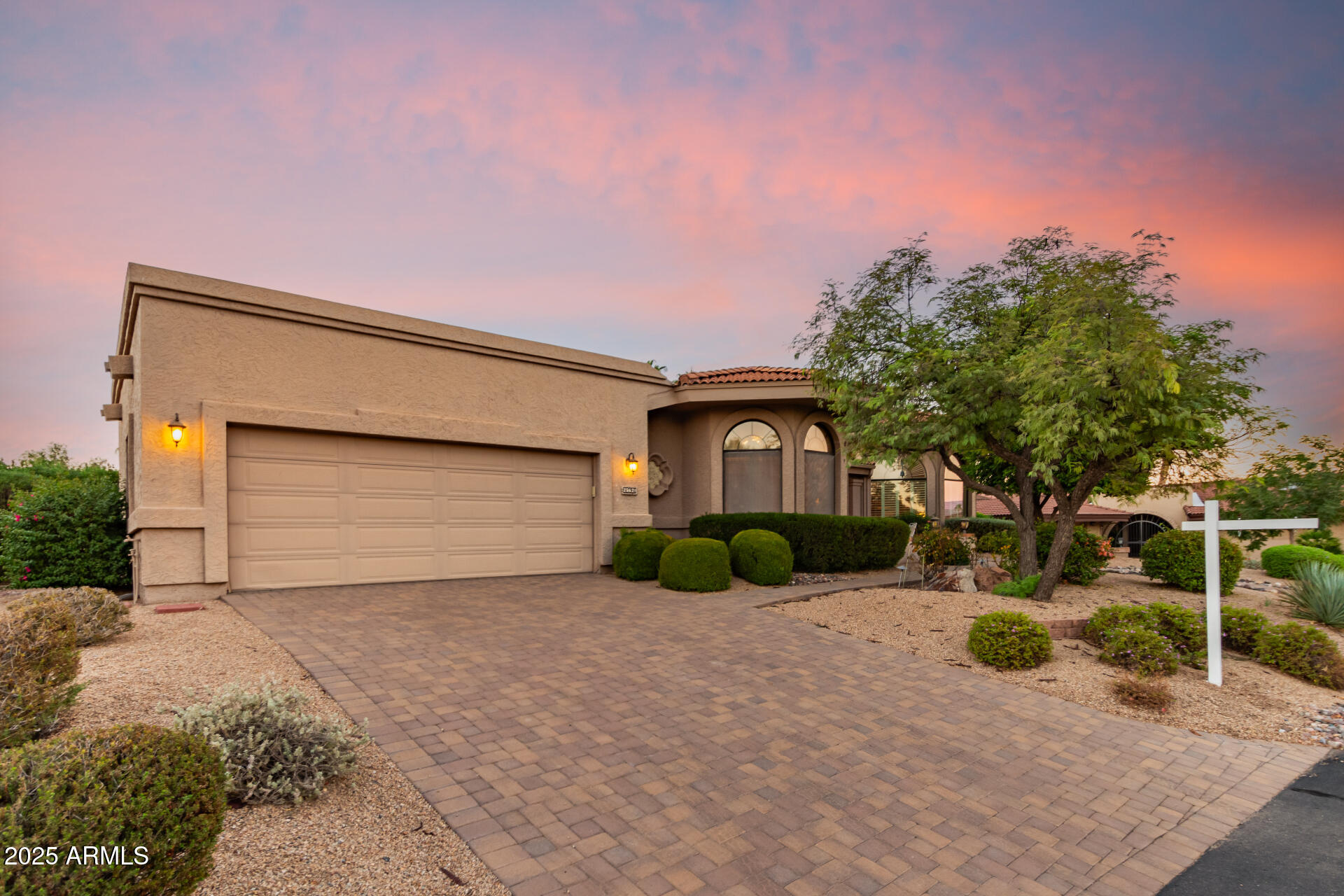 25628 Cordova Lane Rio Verde, AZ 85263 - Photo 3 of 35 a front view of a house with a yard and garage