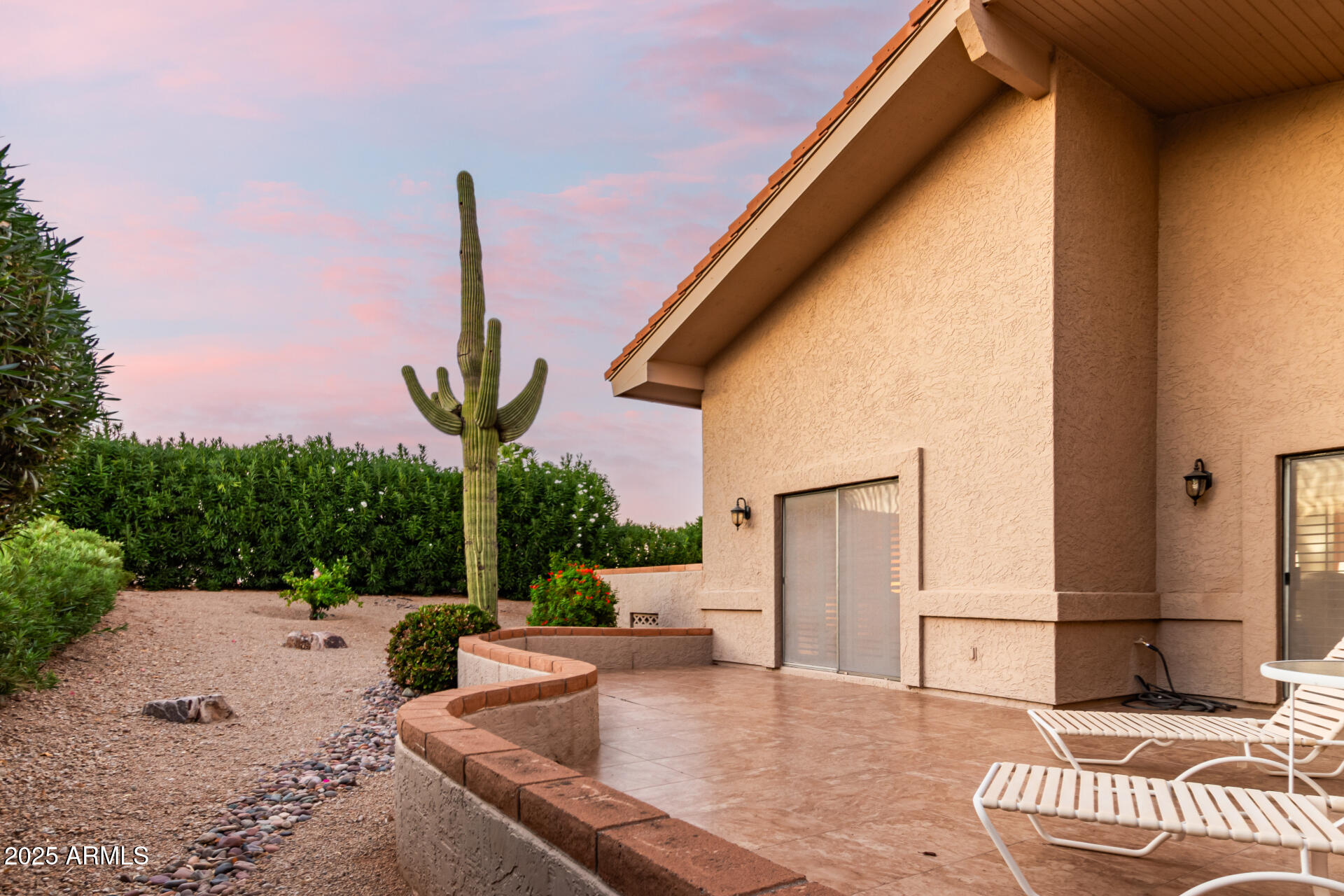 25628 Cordova Lane Rio Verde, AZ 85263 - Photo 32 of 35 a view of a patio with couches and potted plants
