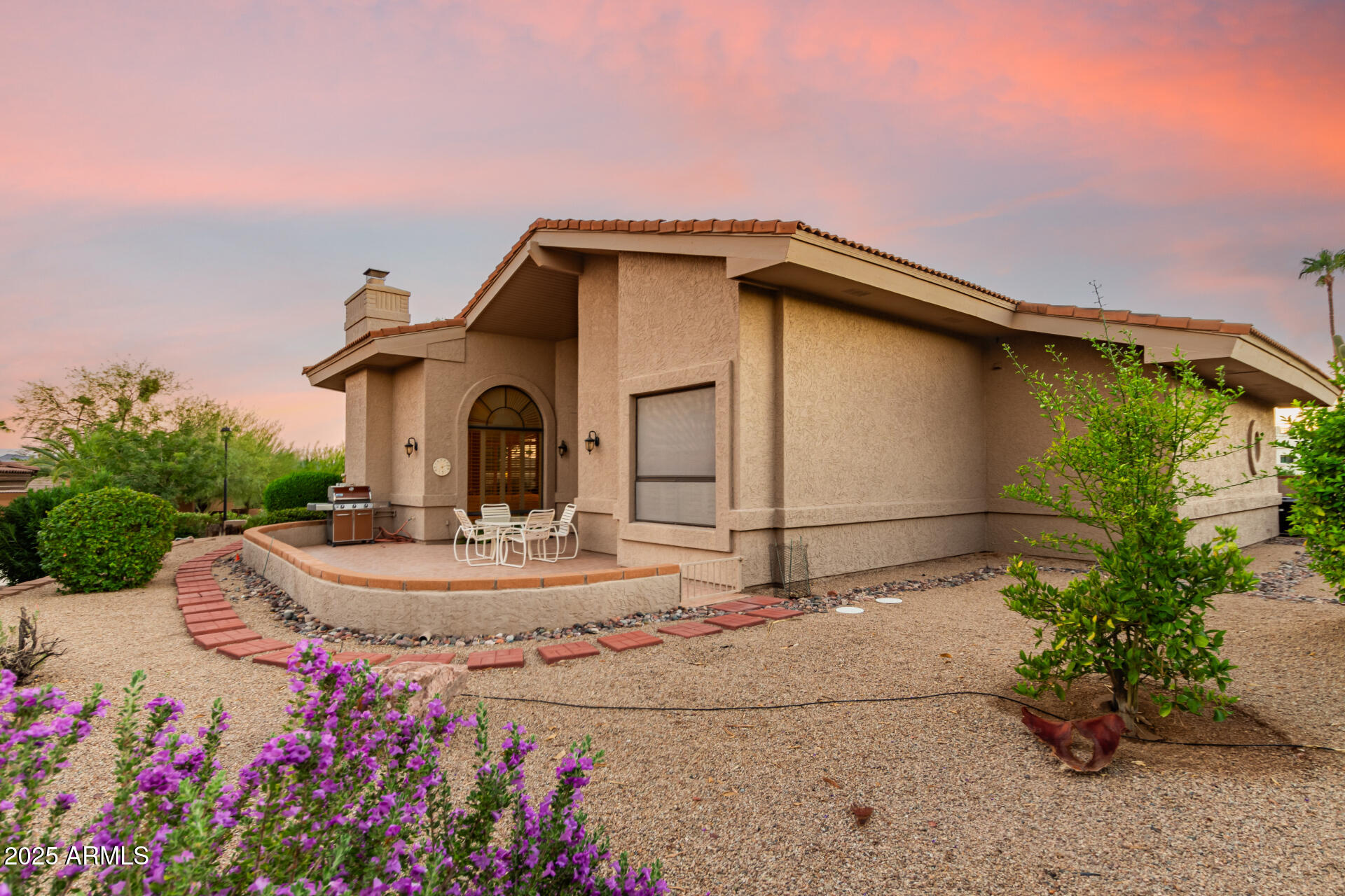 25628 Cordova Lane Rio Verde, AZ 85263 - Photo 33 of 35 a front view of a house with garden