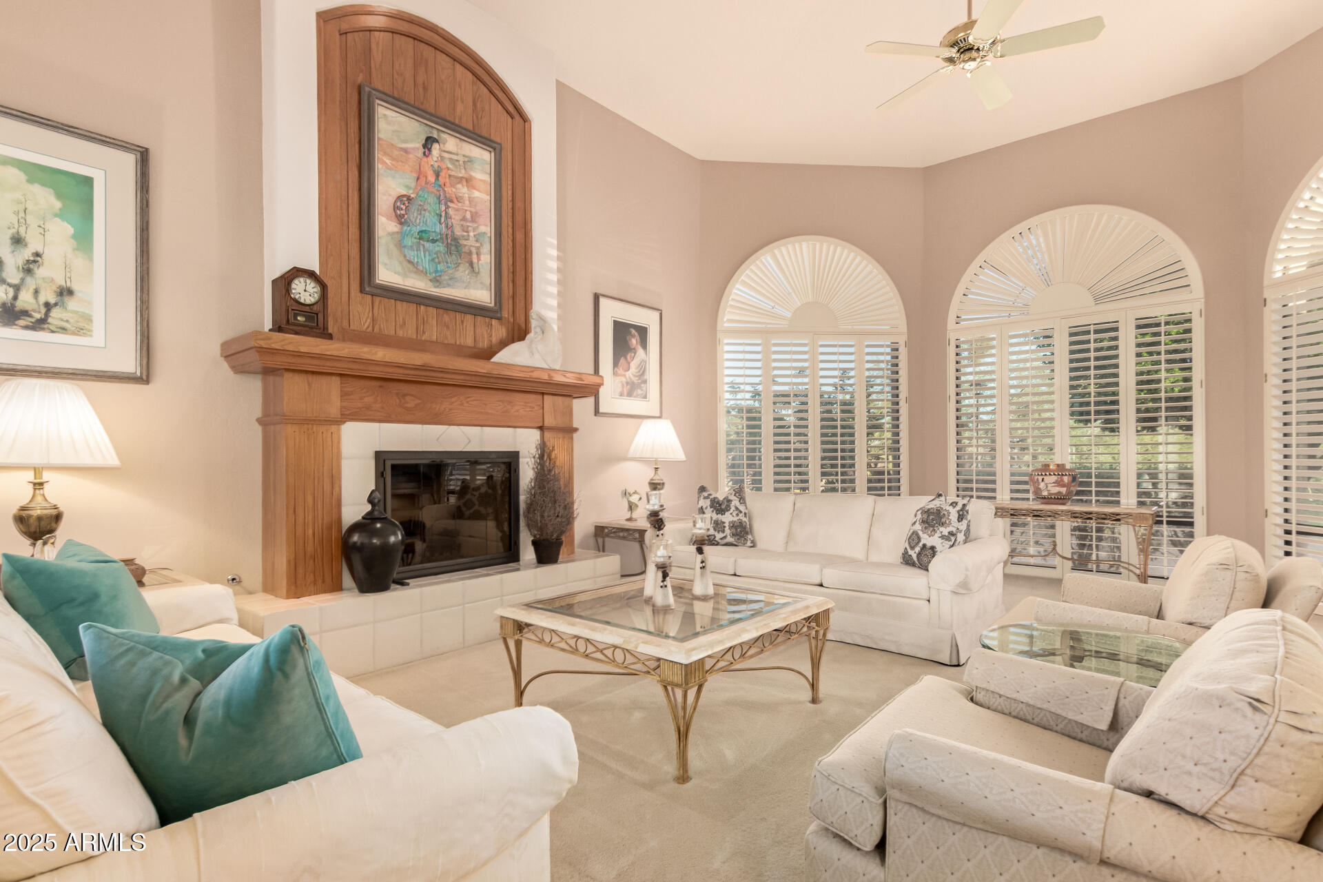 25628 Cordova Lane Rio Verde, AZ 85263 - Photo 6 of 35 a living room with fireplace furniture and a large window