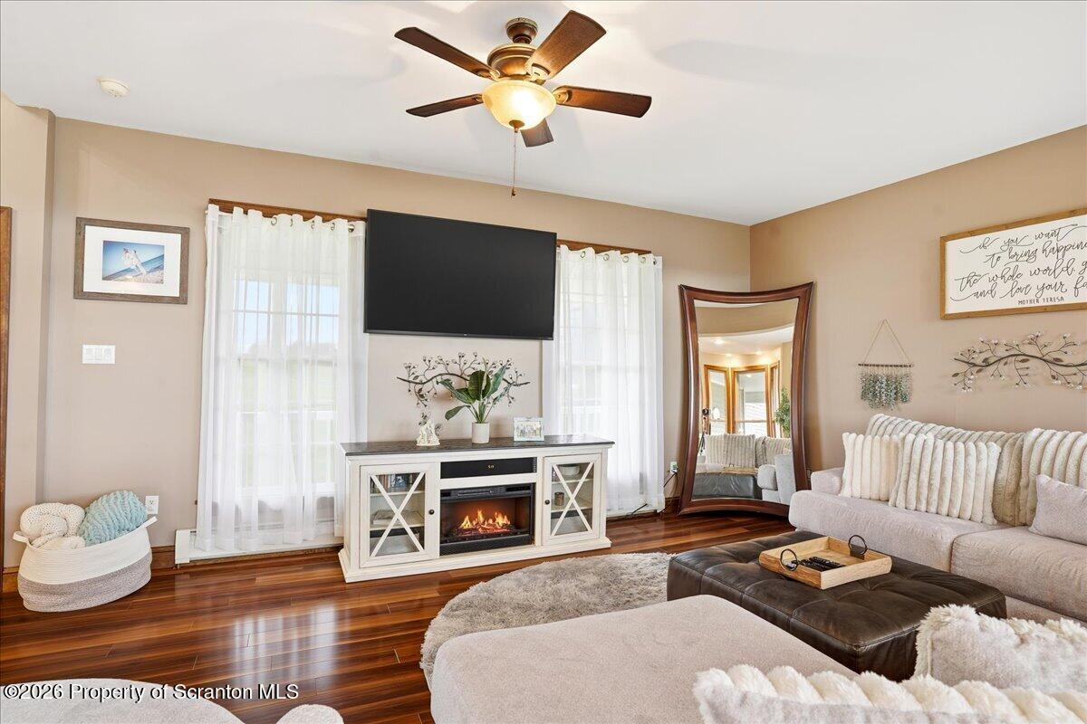 18 Bush Hill Road Great Bend, PA 18821 - Photo 18 of 125 a living room with furniture a fireplace and a flat screen tv