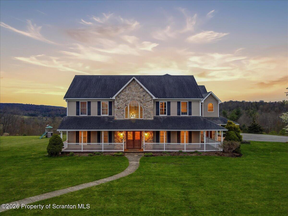 18 Bush Hill Road Great Bend, PA 18821 - Photo 2 of 125 a front view of house with yard and green space