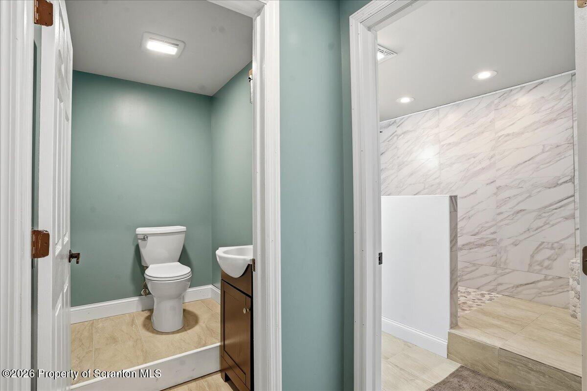 18 Bush Hill Road Great Bend, PA 18821 - Photo 57 of 125 a bathroom with a toilet and a shower