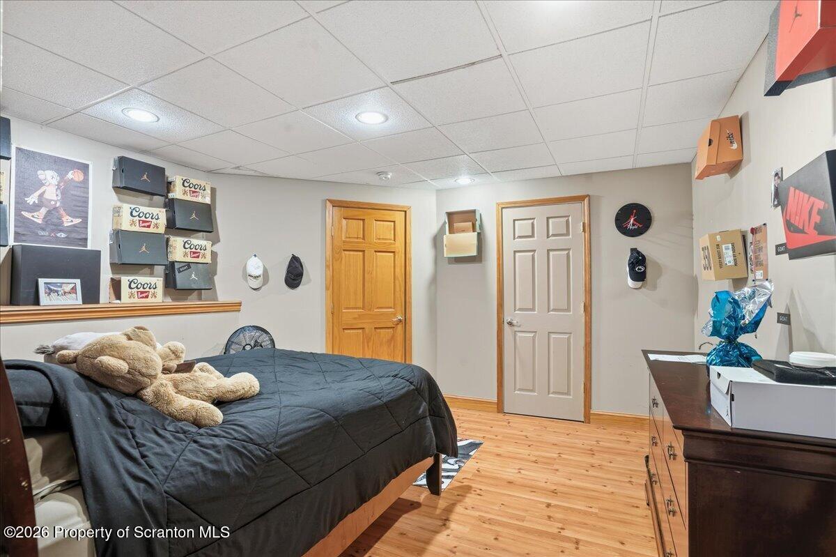 18 Bush Hill Road Great Bend, PA 18821 - Photo 61 of 125 a bedroom with a bed and wooden floor