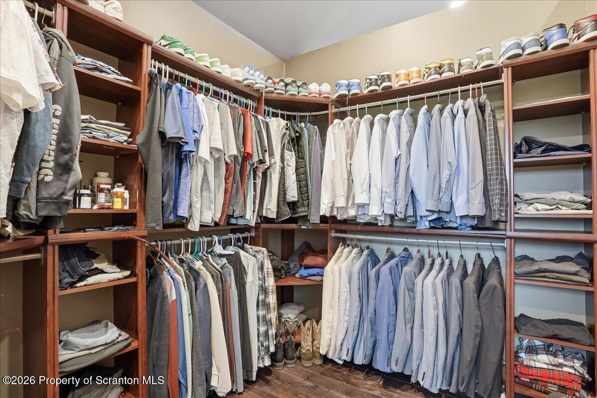 18 Bush Hill Road Great Bend, PA 18821 - Photo 74 of 125 a view of walk in closet with clothes and shoes