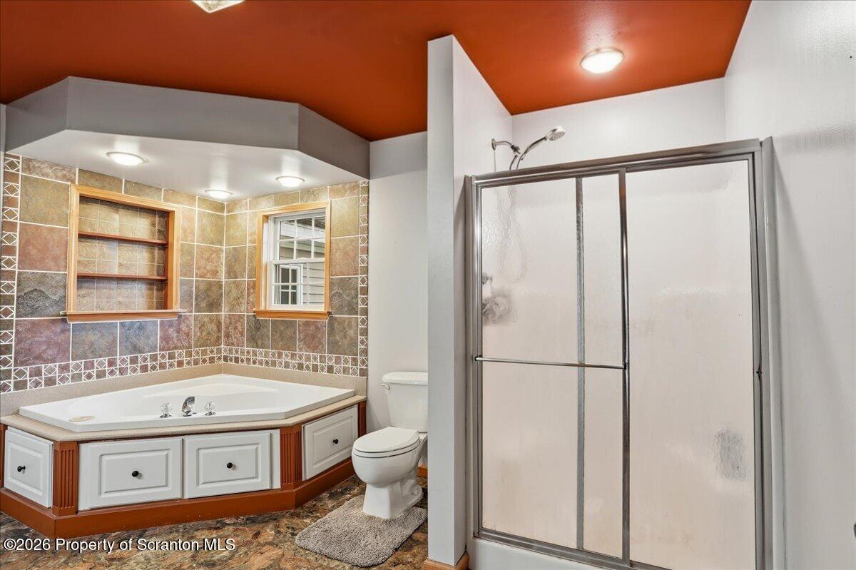 18 Bush Hill Road Great Bend, PA 18821 - Photo 84 of 125 a bathroom with a sink a toilet and a shower