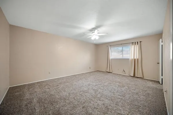 an empty room with a bathroom