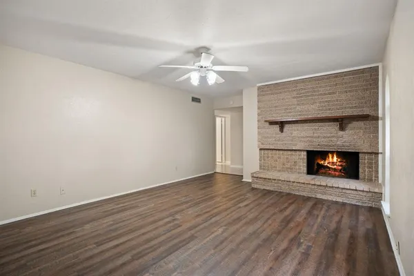 a living room with a fireplace