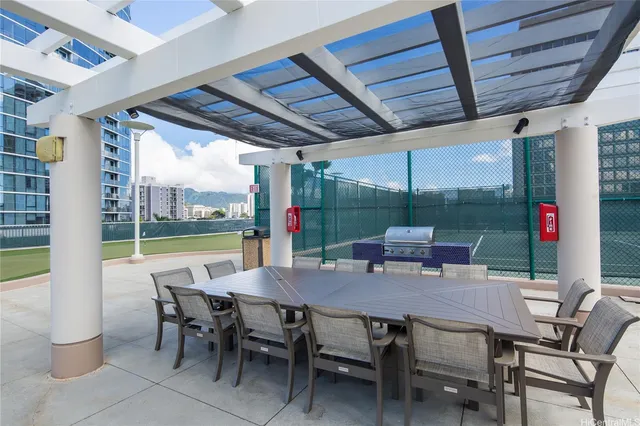 a view of a building with sitting area