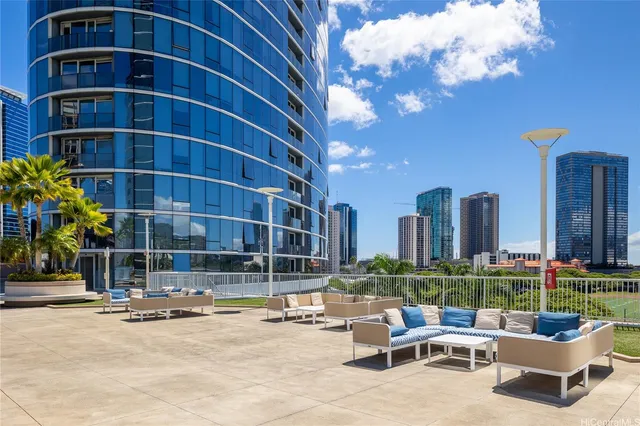 a view of a swimming pool with a yard