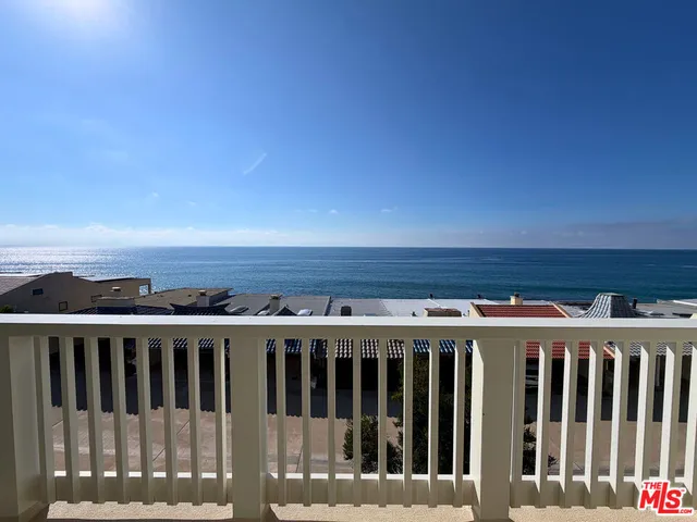 a view of a roof with wooden floor