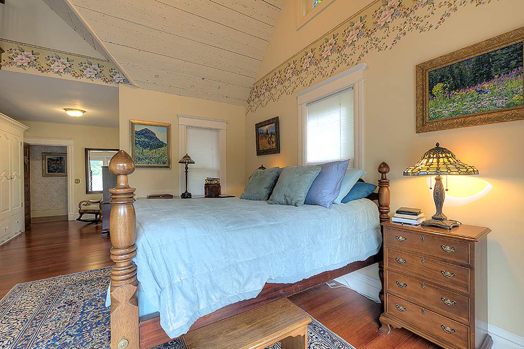 8395 Spring Brook Road Rockford, IL 61114 - Photo 12 of 24 a bed room with a bed and window
