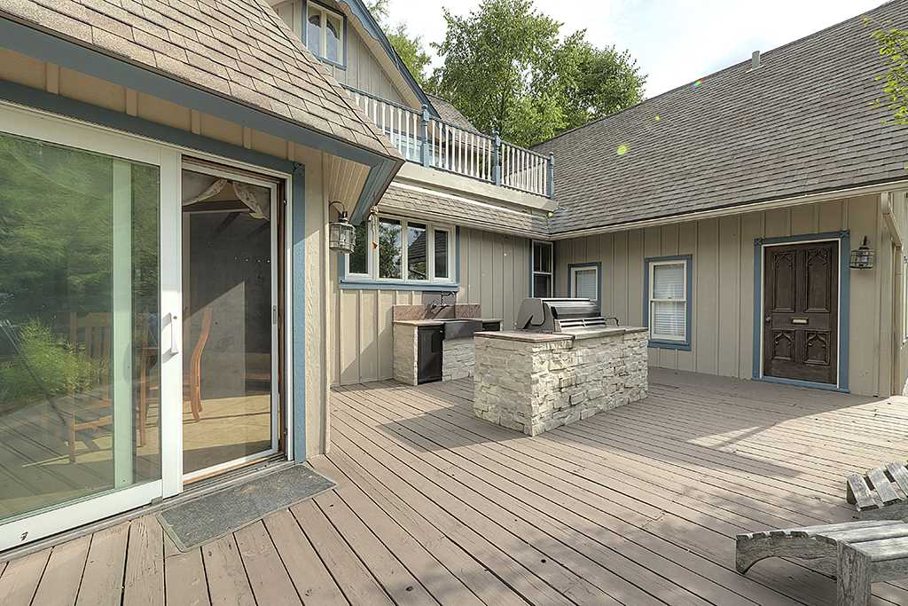 8395 Spring Brook Road Rockford, IL 61114 - Photo 17 of 24 a view of a patio with table and chairs